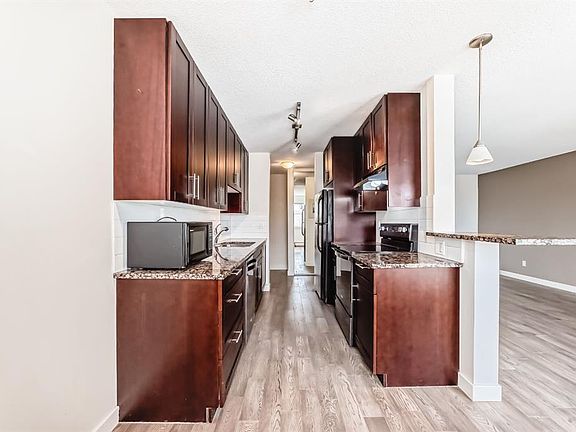 5th image of 4455 A E Greenview Dr NE #302
