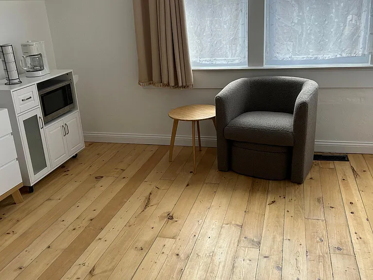 Comfortable accent chair with pull out ottoman with storage!