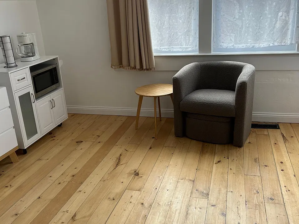 Comfortable accent chair with pull out ottoman with storage!