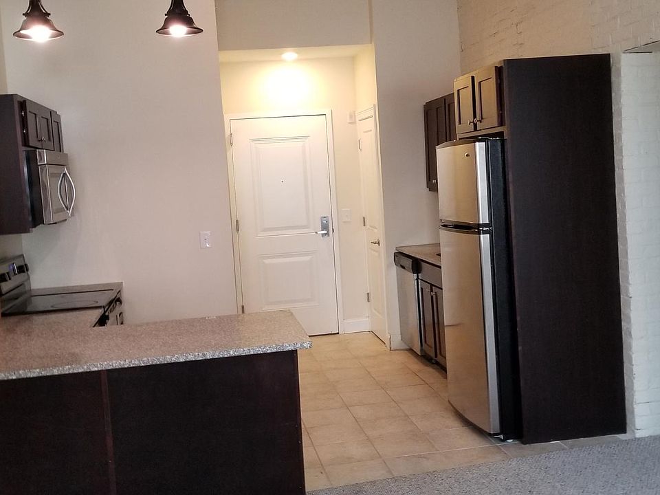 Stainless steel appliances, dishwasher, microwave, non frost fridge with ice maker, Garbage disposal feature in the kitchen sink.