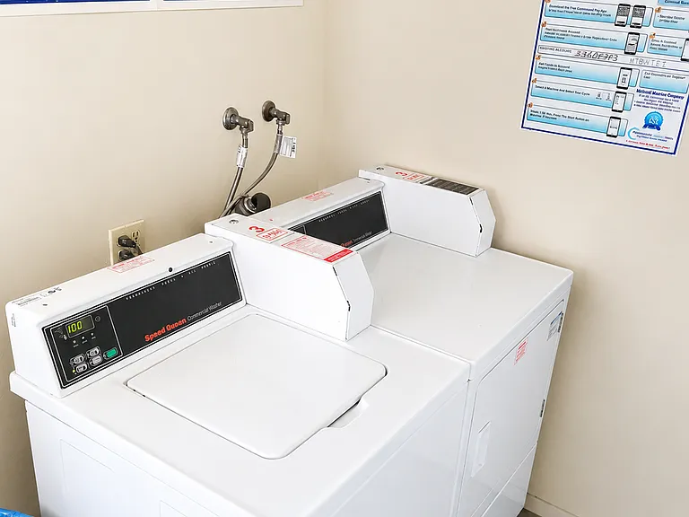 Convenient onsite laundry area located next to the unit.