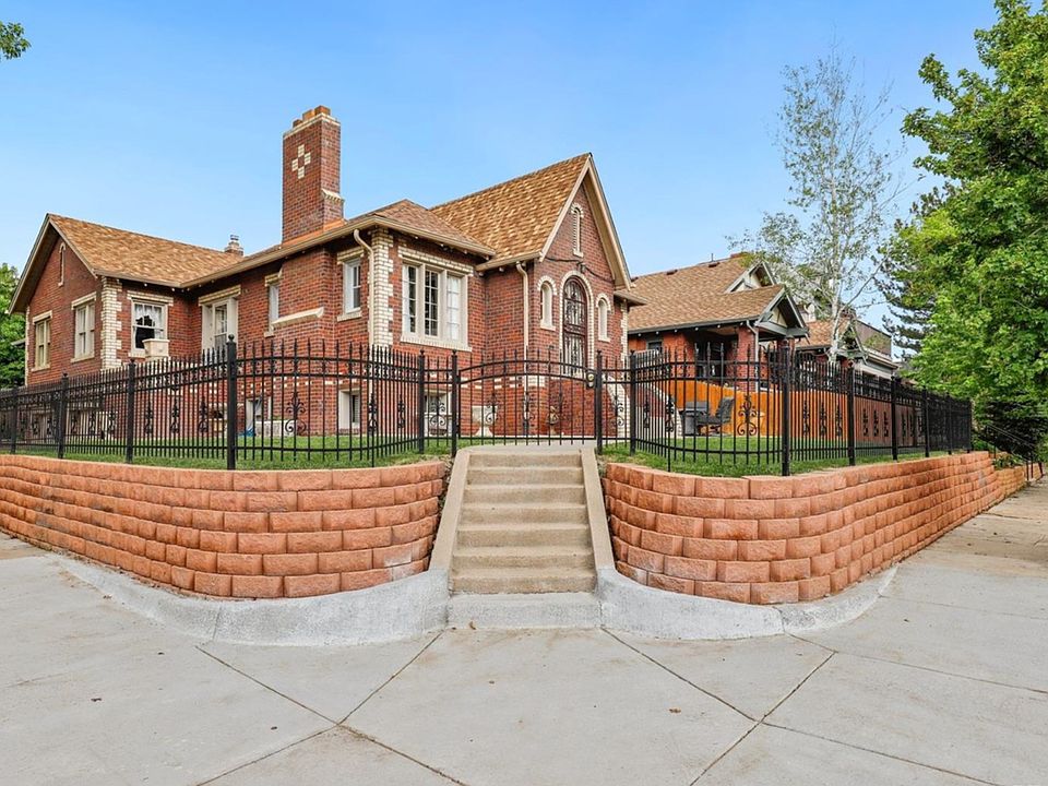 Corner lot, historic iron gate that locks as needed