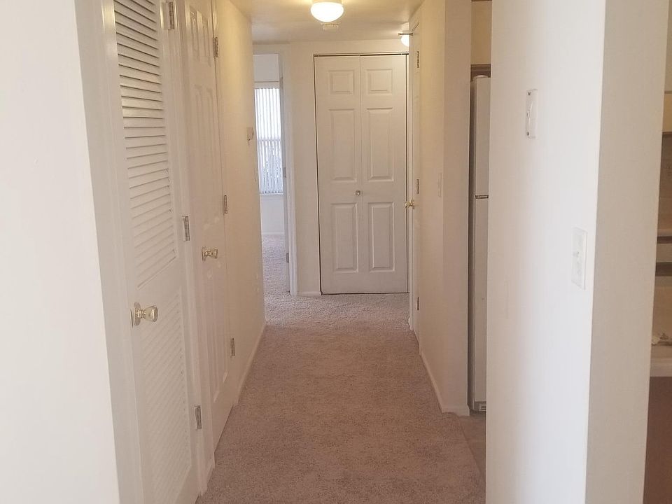 Hallway with Coat and Linen Closets, Washer/Dryer