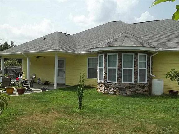 Covered patio. Large yard.