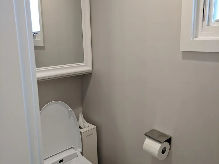 Master Bath: Private toilet room, featuring heated toilet se