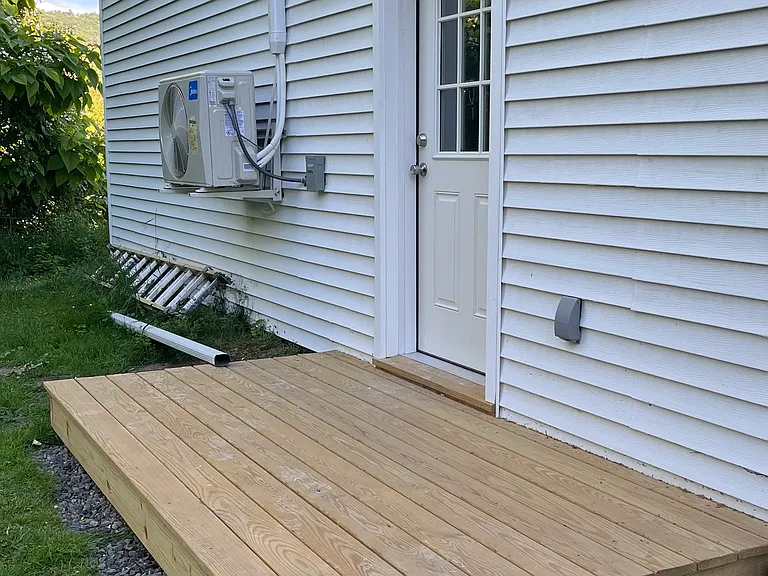 Entrance with deck