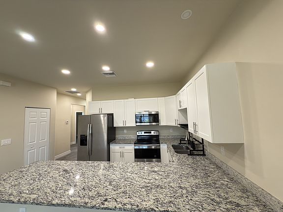 4th image of 5029 Leonard Blvd S