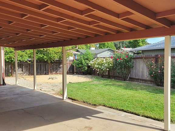 Covered patio in the back of the house