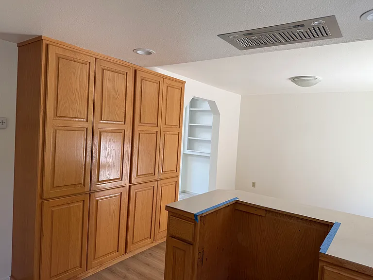 Pantry storage, pull out shelving. (Slide in range coming)