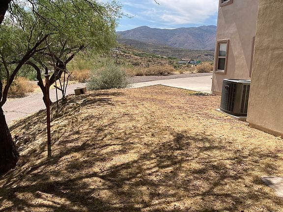 Bottom floor patio area looking westward towards the Bradshaw Mountains