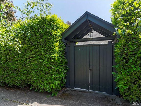 Tall hedge for privacy.