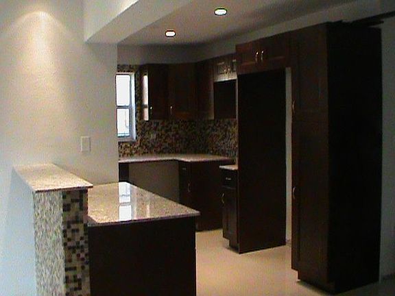 Kitchen.  Real Wood Cabinets. Granite Countertops. Pantry. 