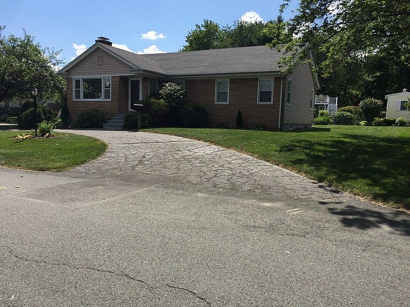 1 of 2 driveways!
						:
						2nd driveway on the side of house where garage is!