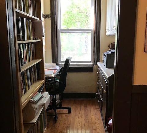 Pantry off kitchen being used as an office