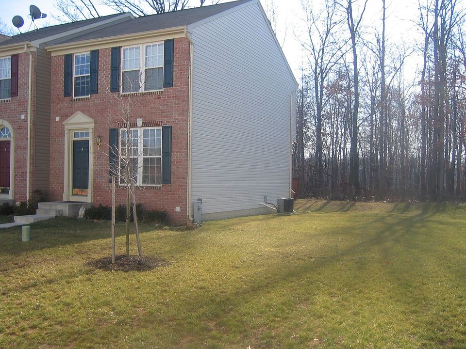 brick front, large side lawn