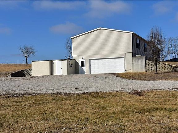 Two-car garage with outside entrance as well as interior access.