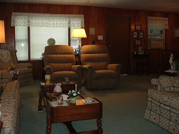 Living room closer to entry door.