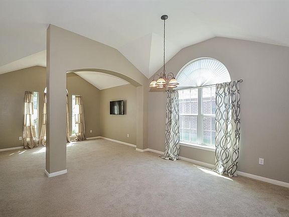 The formal dining room is open to the living and will accommodate your larger dining set.
