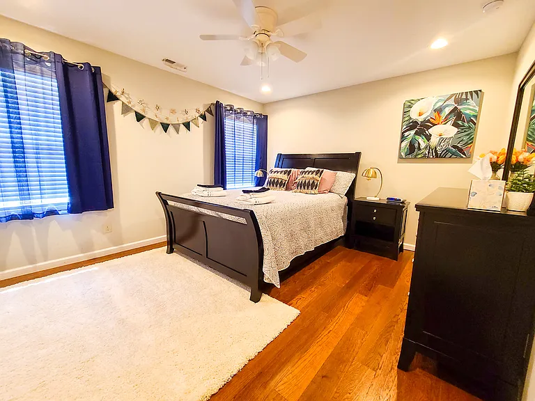 Bedroom 3/4 - Large bedrooms with large, bright windows and multiple lighting options with a fan.