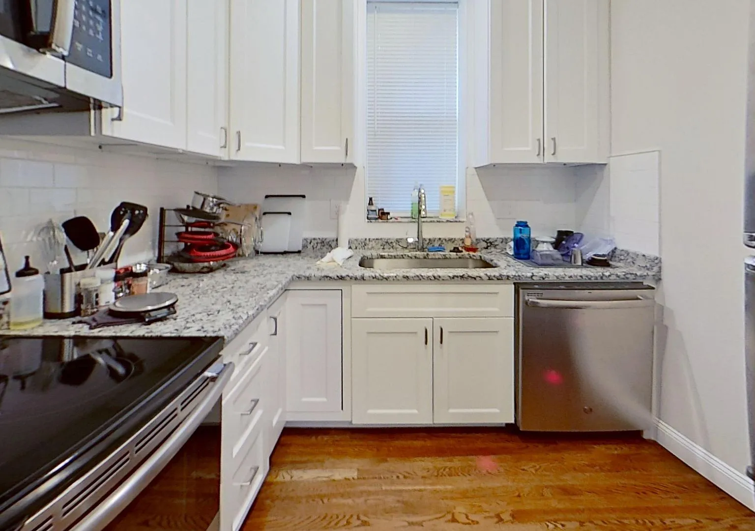 Modern 2-Bed Condo with Parking Steps from the Green Line & Boston Colleges! — Photo 3