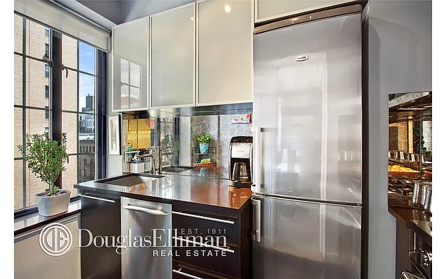Sold by Douglas Elliman | media 13