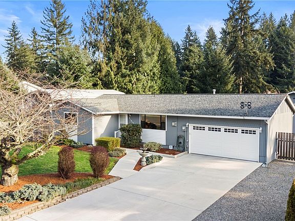  Meticulously maintained home featuring 3 bedrooms and completed updated bath~2 car attached garage + huge detached shop and covered RV parking