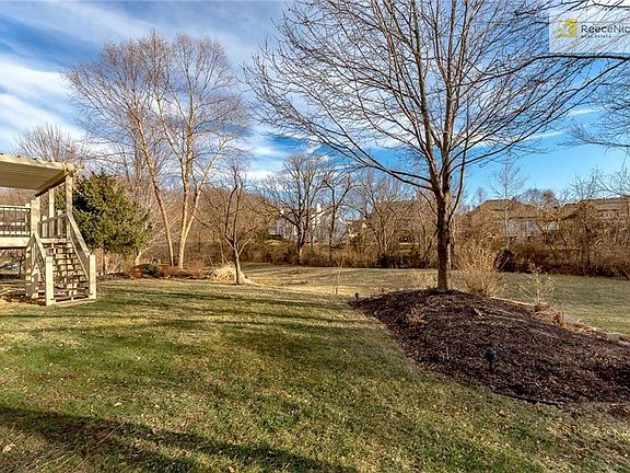 Backyard adjoins permanent green space for your privacy and enjoyment of nature!