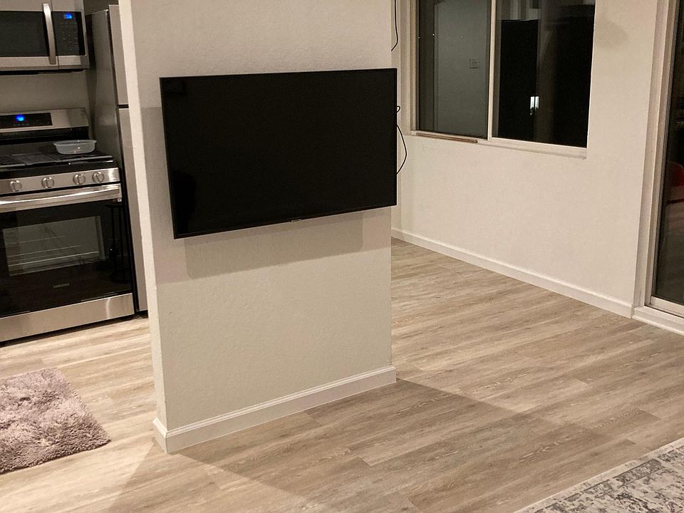 Living room towards kitchen & dining