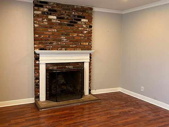 Once inside the front door the fireplace and mantle greet you in the main living room