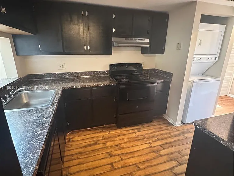 6575 W Oakland Park Blvd #218 — Photo 4
