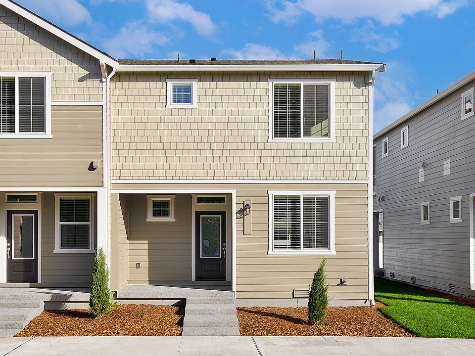 The Crane is a beautiful two story plan with siding.