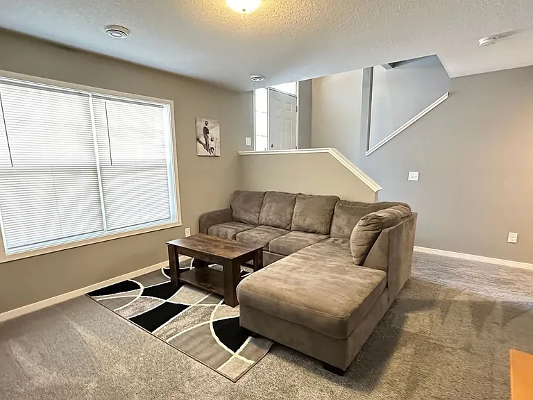Transform your living experience at LS Capital Group with this cozy and stylish living space. Enjoy modern comforts and spacious design, perfect for relaxation and entertaining. Explore this inviting home today!