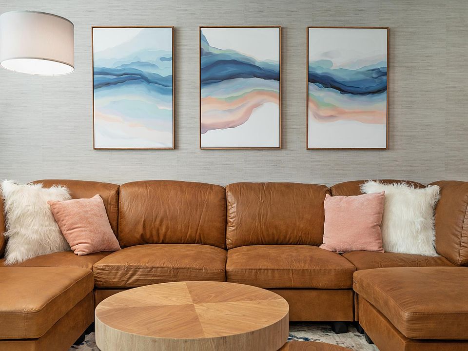 Cozy living room area with soft couch.