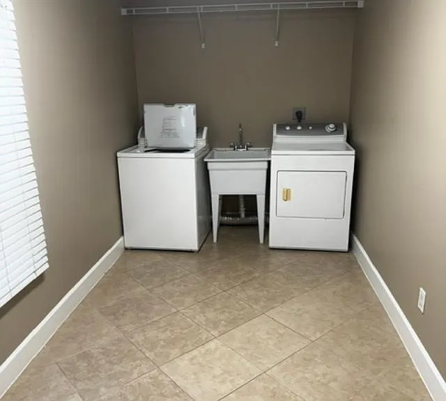 Multi-Functional Laundry/Utility room, very spacious with shelving