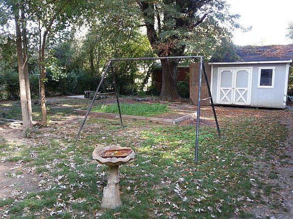 Backyard with Storage Bldg