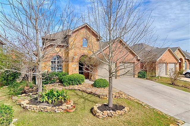 Enjoy trees and carefully crafted landscaping which complement the classic exterior of thislovely home. In a good, established area of Shadow Glen, it is close to the park and pool, yettucked away. Constructed by the outstanding builder Highland Homes, no