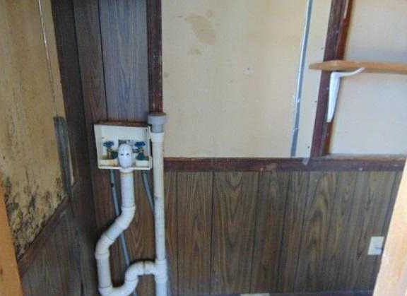 laundry in enclosed porch