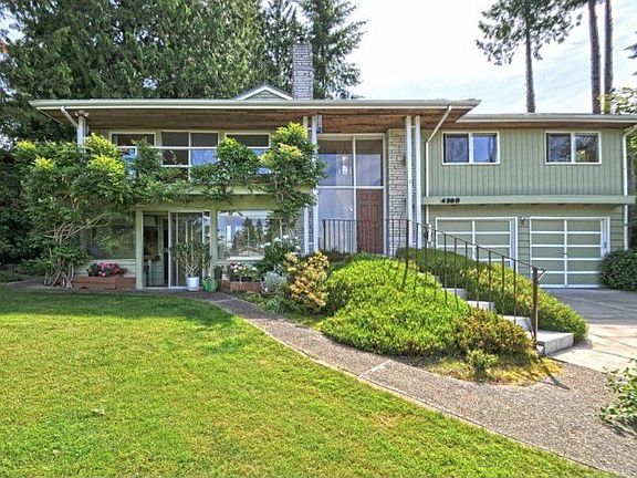 Welcome to your peaceful retreat in the city. Home sits on a beautiful lot just east of the Vashon Ferry Dock