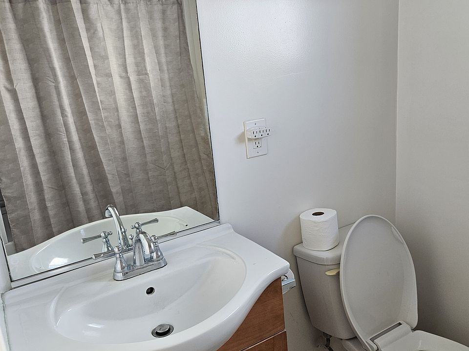 Bright large bathroom with new tub