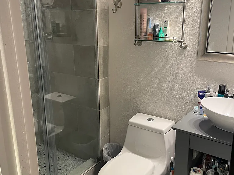 Bathroom is accessed from the kitchen