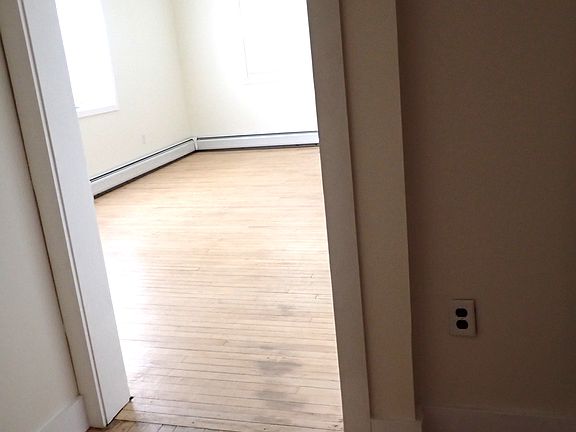 entry hall to apartment with large storage closet