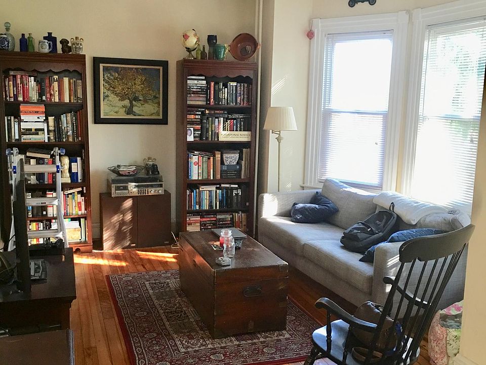 Super sunny living room with high ceilings