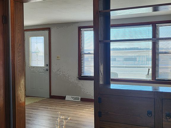 Kitchen looking out to living room.