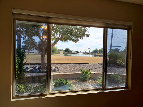 Family room offers gorgeous golf course and water feature view!