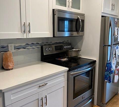 Watch boats go by from the kitchen