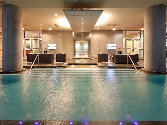 Two flat screen TVs flank the interior pool deck to allow you to catch a game.