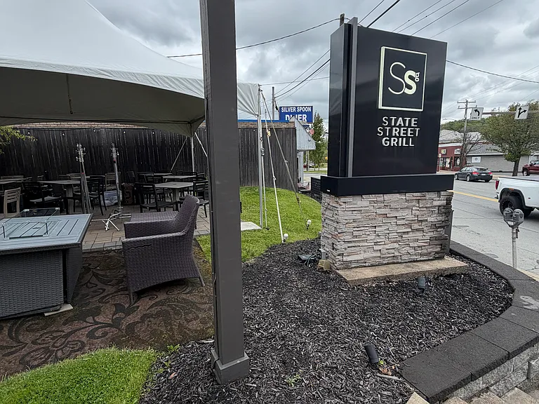 State Street Grill - Restaurant with indoor and outdoor bars with outdoor lounge seating serving delicious food & drinks - around the corner from the property