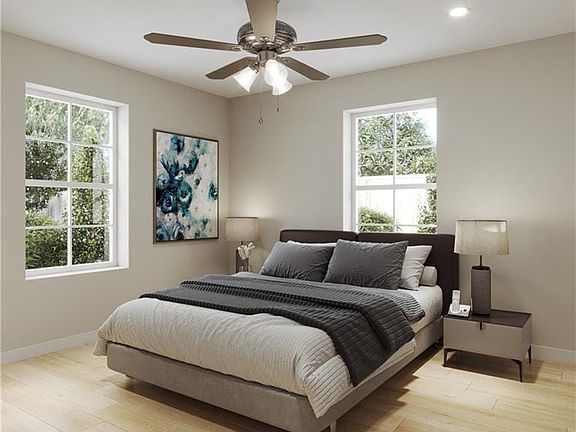 Bedroom rendering with light hardwood / wood-style flooring and ceiling fan