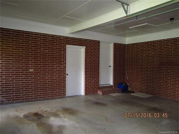 Oversized two car garage with large storage closet and laundry room.