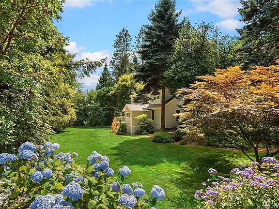 Lush grounds surround this 2,200 Sq. Ft farmhouse built in 1922. Over $150,000 in recent updates includefull exterior weatherization including new tar paper/house wrap, flashing, caulking, draft control measures, new siding with smart trim + exterior paint + new deck and stairs. 